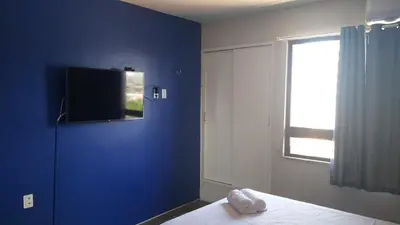 Uma cama ou camas num quarto em 805 Flat mobiliado Praia de Iracema