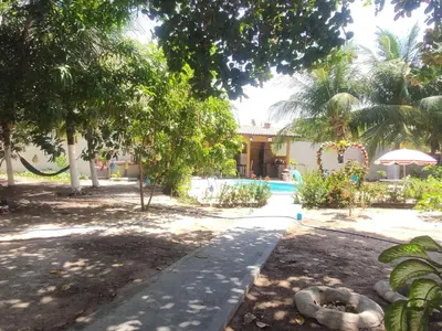 Um jardim no exterior de Aconchego da Nina