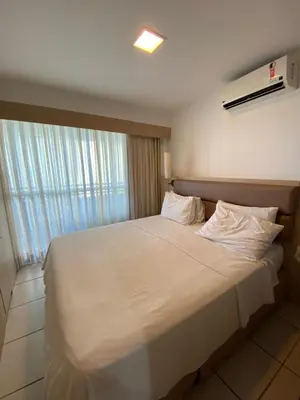 Uma cama ou camas num quarto em Beach Class - Vista Mar