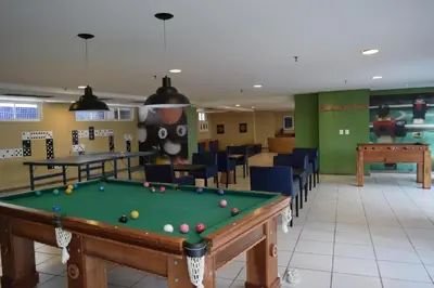 Uma mesa de bilhar em Beach Class - Vista Mar