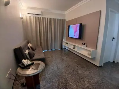 Uma televisão e/ou sistema de entretenimento em Saint Martin By Escala Imóveis