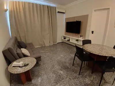Uma televisão e/ou sistema de entretenimento em Saint Martin By Escala Imóveis