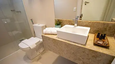 Uma casa de banho em Paraiso Beach Hotel