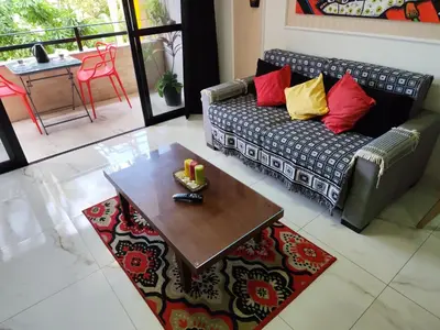 Uma área de estar em Lindo Apartamento na Praia do Futuro