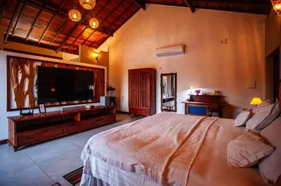 Uma cama ou camas num quarto em Hotel de Charme Illuminare Stile