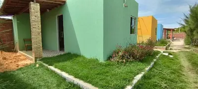 Um jardim no exterior de Gold Star Village Kitnet equipado