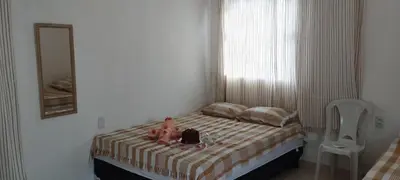 Uma cama ou camas num quarto em Gold Star Village Kitnet equipado
