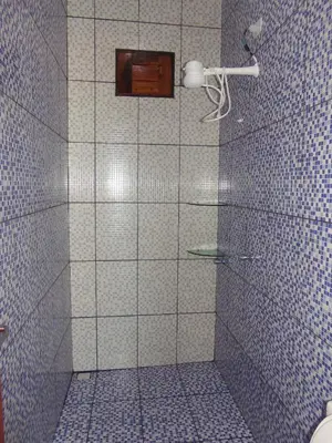 Uma casa de banho em CHALÉ COQUEIROS