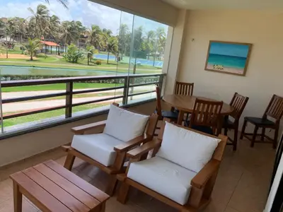 Uma varanda ou terraço em Apartamento no Aquaville Resort, do lado da sombra e perto da praia
