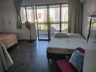 Uma cama ou camas num quarto em Via Venetto Flat próximo a feirinha da beira-mar Fortaleza