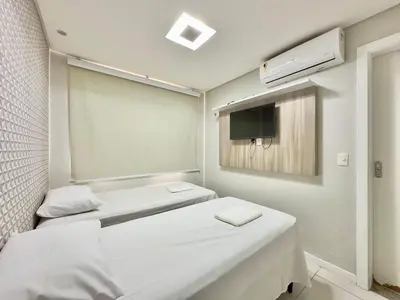 Uma cama ou camas num quarto em Mandara Lanai Resort - Porto das Dunas