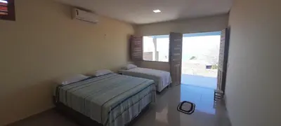 Uma cama ou camas num quarto em Pousada Chalés do Castelo