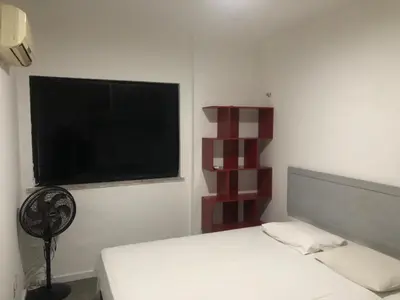 Uma cama ou camas num quarto em Flat Beira Mar - Via Venetto