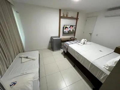 Uma cama ou camas num quarto em Golf Ville Resorts 3 Suites
