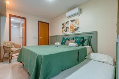 Uma cama ou camas num quarto em Scopa Beach #C2100 - Porto das Dunas por Carpediem
