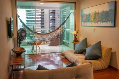 Uma área de estar em Apartamento Vista mar melhor localização da cidade