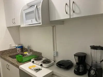 A cozinha ou kitchenette de 104 Apart mobiliado vista mar Praia de Iracema