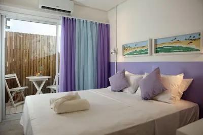 Uma cama ou camas num quarto em Saint Germain Wind Residence