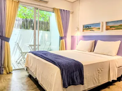 Uma cama ou camas num quarto em Saint Germain Wind Residence