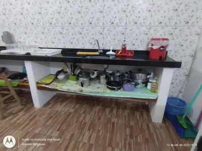 A cozinha ou kitchenette de Suíte GUARAMIRANGA no Sítio