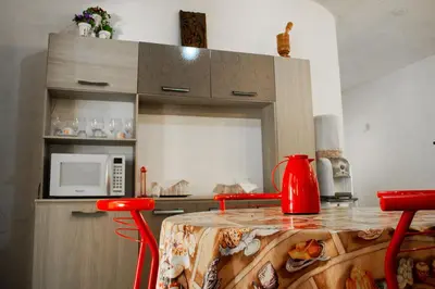 A cozinha ou kitchenette de Casa perto da Praia Canto da Barra em Fortim CE