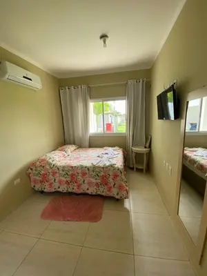 Uma cama ou camas num quarto em Boas Vistas Canoa Quebrada