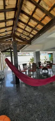 Uma área de estar em Pousada Temporada Atlântica