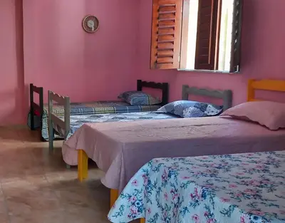 Uma cama ou camas num quarto em Hostel Horizonte Ceará