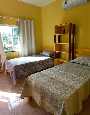 Uma cama ou camas num quarto em Hostel Horizonte Ceará