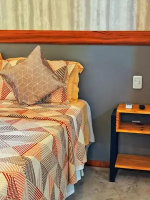 Uma cama ou camas num quarto em Pousada Canaã Icaraizinho