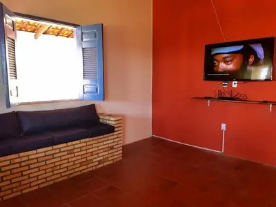 Uma televisão e/ou sistema de entretenimento em Casa em Águas Belas CE