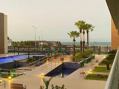 A piscina em ou perto de VG fun - Apto Suíte Pé na Areia