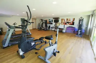 O centro de fitness e/ou as comodidades de fitness de VG fun - Apto Suíte Pé na Areia