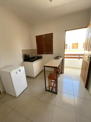 A cozinha ou kitchenette de Viva Praia Flats, maravilhosa hospedagem na praia!