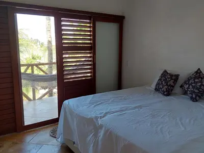 Uma cama ou camas num quarto em Villa Aracoara