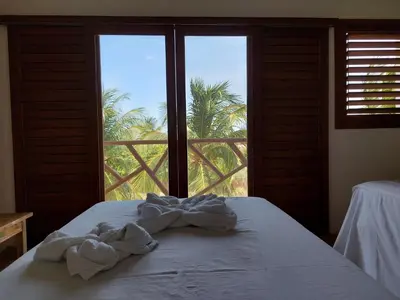 Uma cama ou camas num quarto em Villa Aracoara