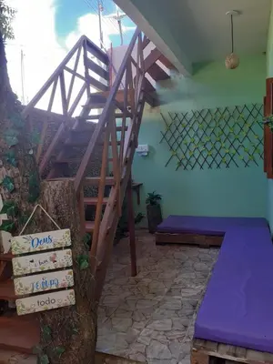 Uma cama ou camas num quarto em Pousada Recanto das Flores