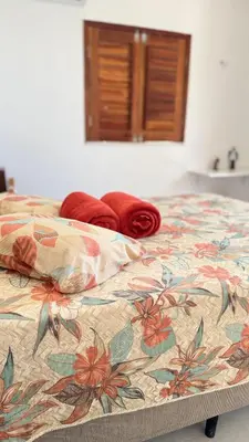 Uma cama ou camas num quarto em Lounge Pdd - Espaço inteiro