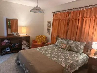 Uma cama ou camas num quarto em Sítio São Gerardo - Aconchegante casa no campo.