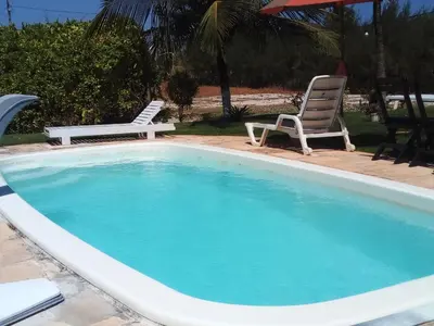 A piscina em ou perto de Chalés Ed Moitas