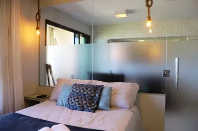 Uma cama ou camas num quarto em Cumbuco - VGSun Apartment 402