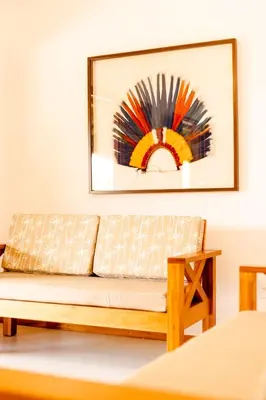 Uma área de estar em UNKUÉ POUSADA FLATS