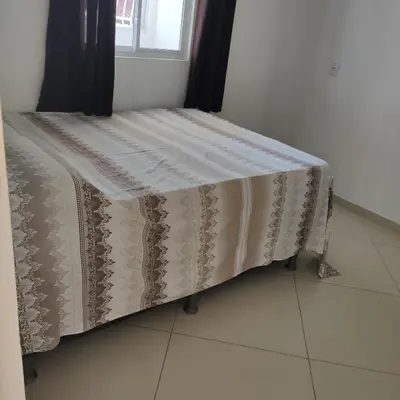 Uma cama ou camas num quarto em Casa Germania