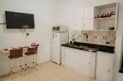 A cozinha ou kitchenette de Studio à 400m mar,cozinha completa, wi-fi 95mbs ideal para casais