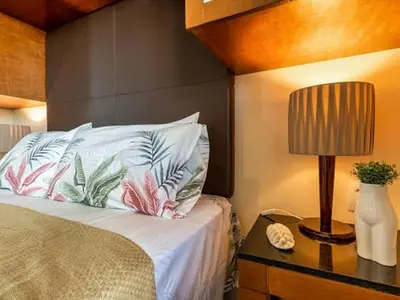 Uma cama ou camas num quarto em VG SUN Apartamento com vista para o mar - High speed internet