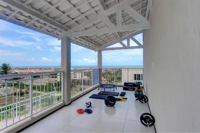 Uma varanda ou terraço em Beach Townhouses #C7 - Com jacuzzi by Carpediem