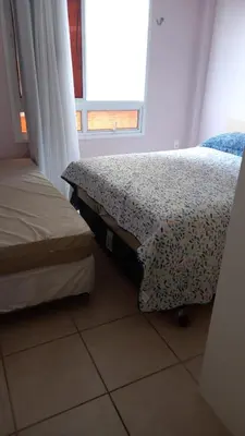Uma cama ou camas num quarto em Vila do Porto Resort