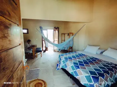 Uma cama ou camas num quarto em Vila Samin Moitas