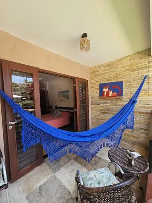 Um pátio ou outra área exterior em Apartamento pé na areia Cumbuco