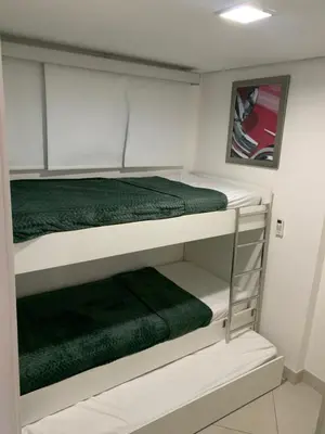 Uma cama ou camas num quarto em Landscape Platinum - Flat de frente para o Mar